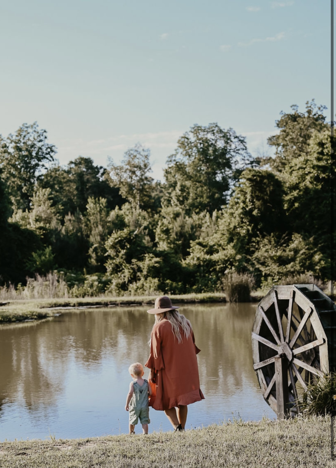 Taylor with her child by the water — Solace & Pine